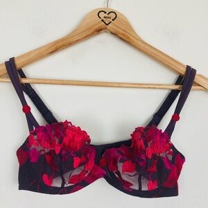 Aubade balconette bra in sheer purple color with red pink floral details. 32D